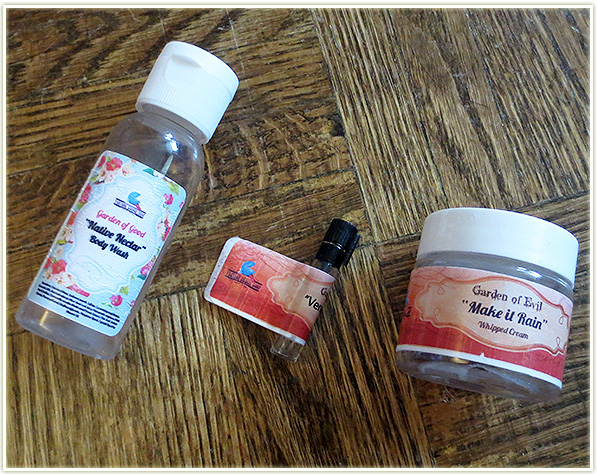 l-r: Fortune Cookie Soap: Native Nectar Body Wash, Venus Fly Trap Perfume Oil, Make it Rain Whipped Cream